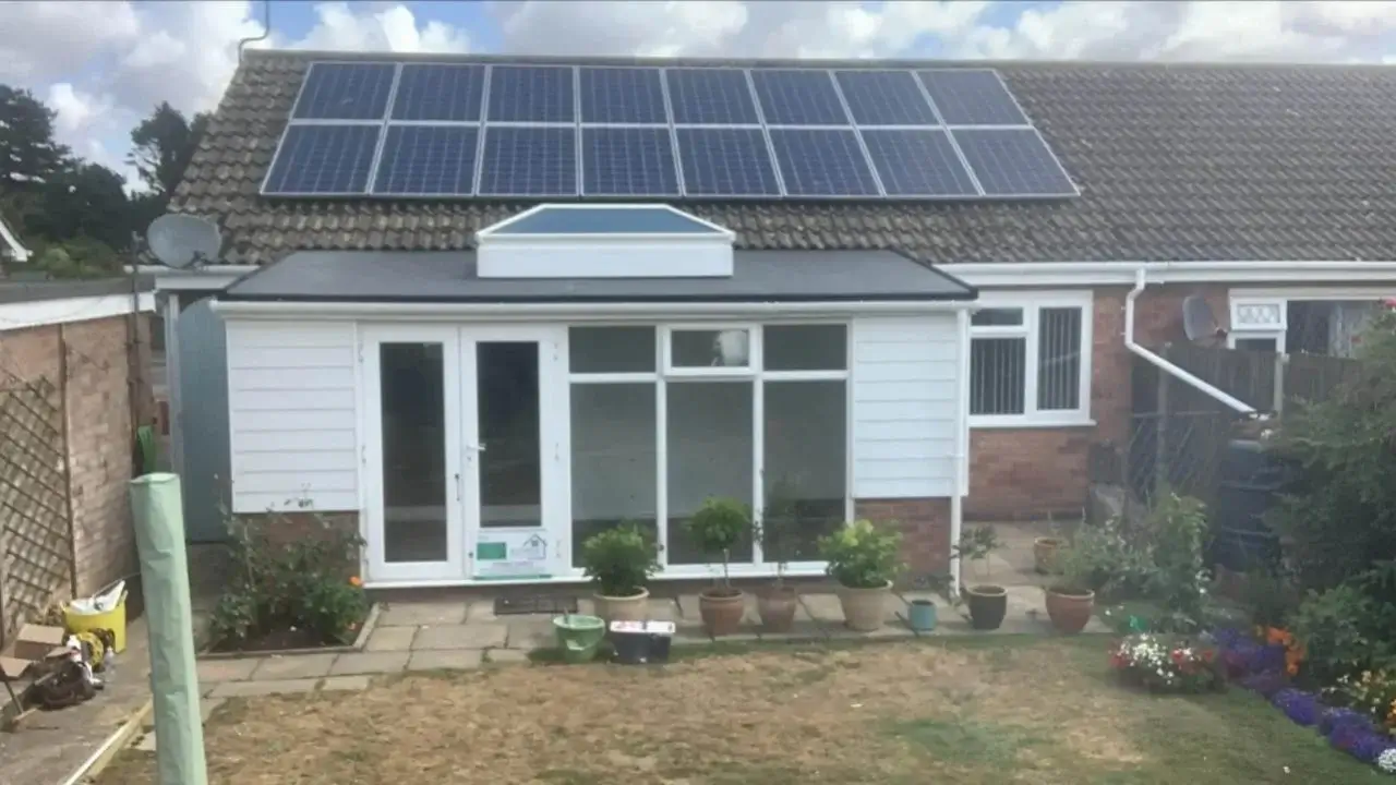 Completed modern anthracite Firestone EPDM warm roof with a sleek Korniche glass roof lantern installed on a Stalham property by Norfolk Exterior Solutions